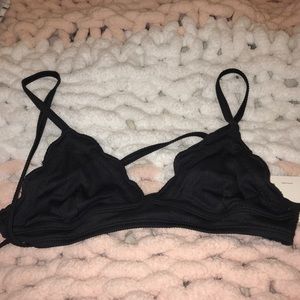 Out from under scalloped bikini top